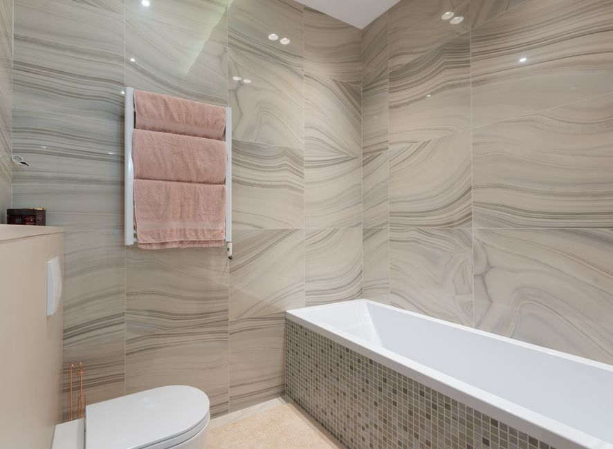 Expert tile installation on bathroom floors and walls